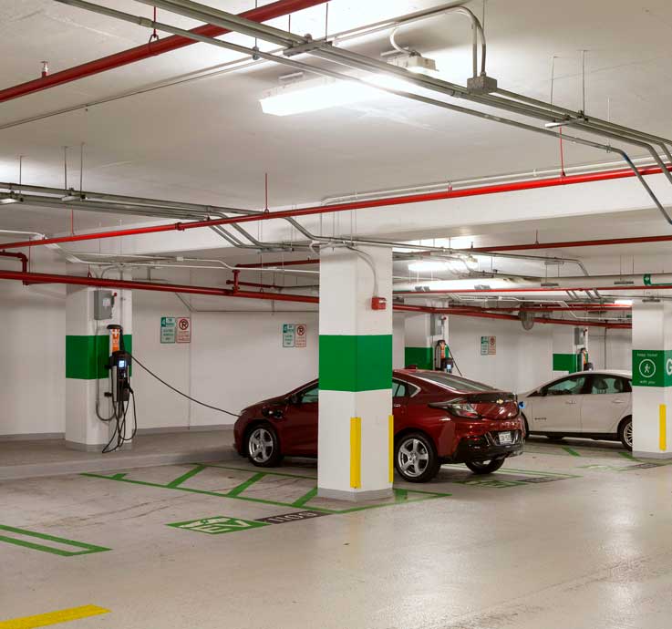 electric vehicle charging station in parking garage
