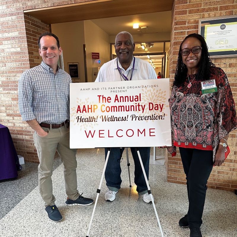 Council President Glass poses with Rev. Kenneth Nelson and Pat Grant at AAHP Community Day.