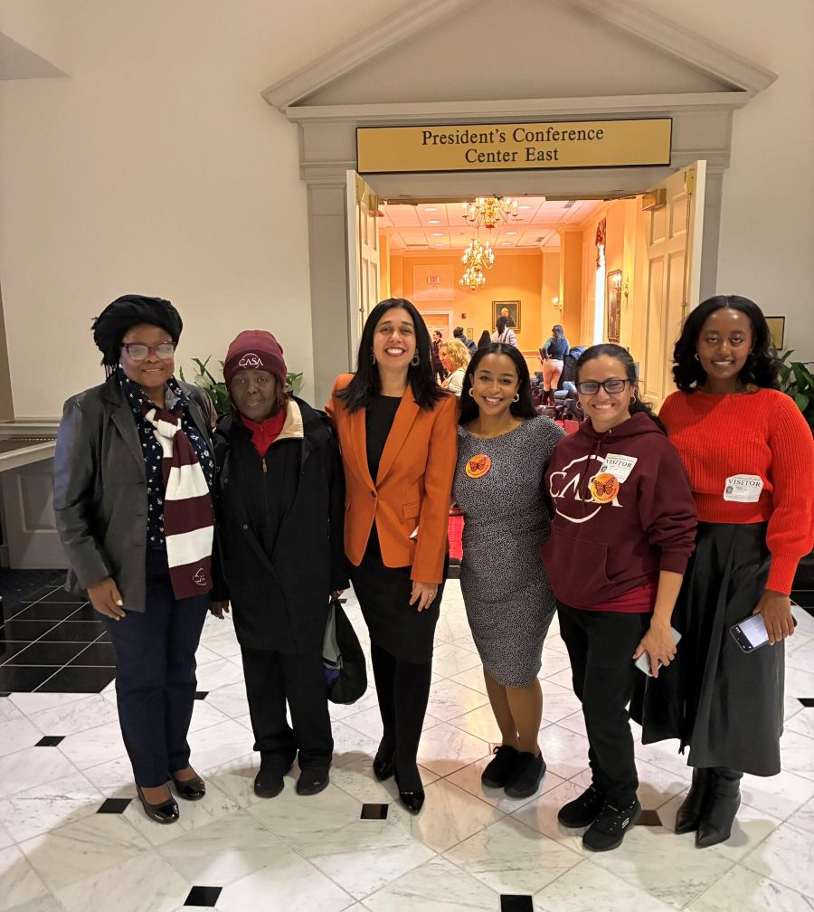Council President Fani-González stands with CASA representatives in Annapolis state house.