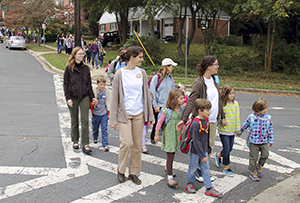 Kids and adults walking to school