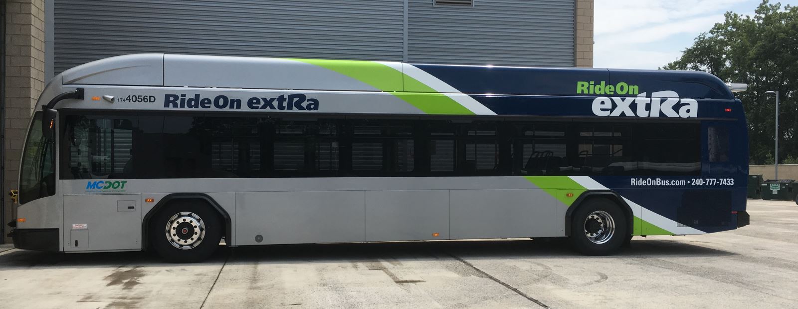 side view of Ride On Extra bus