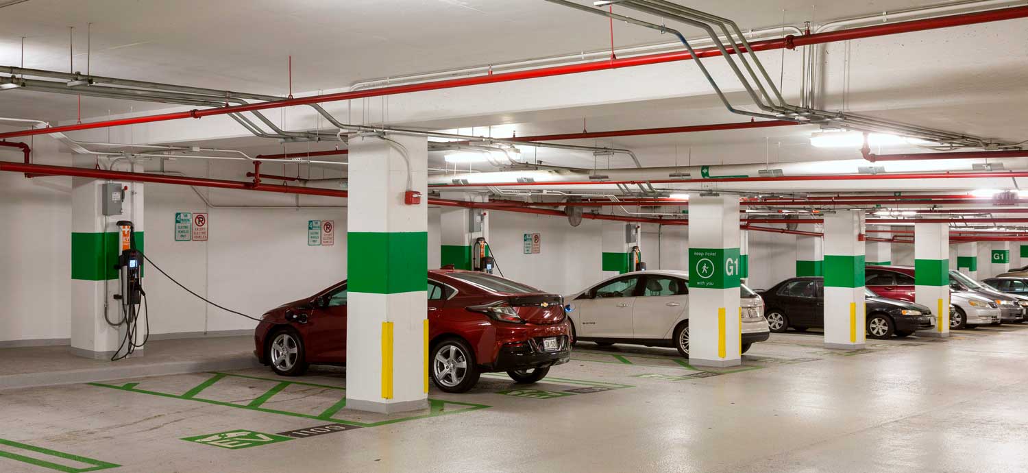 electric vehicle charging station in parking garage