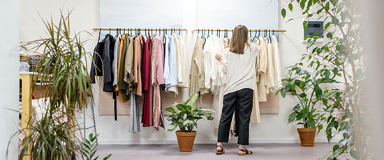 woman with clothes rack