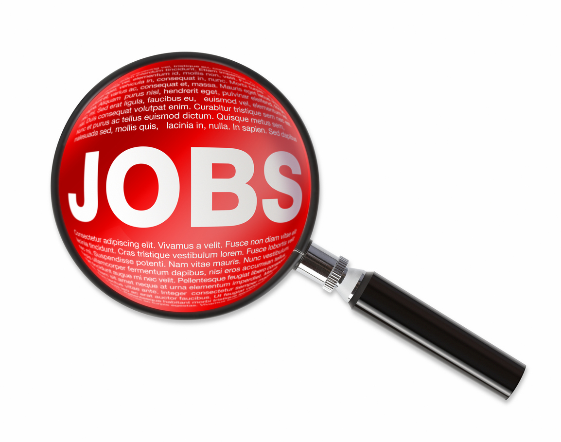 Magnifying glass revealing JOBS text