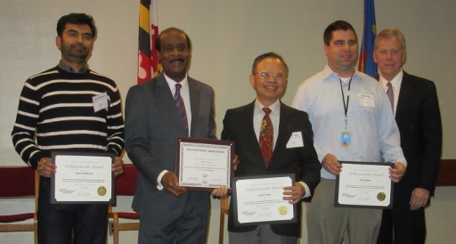 NACo Award Ceremony 2016, with County representatives holding certificates
