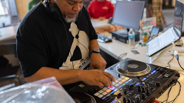 person at a turntable