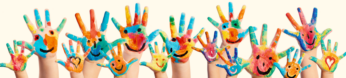 painted hands with smile faces