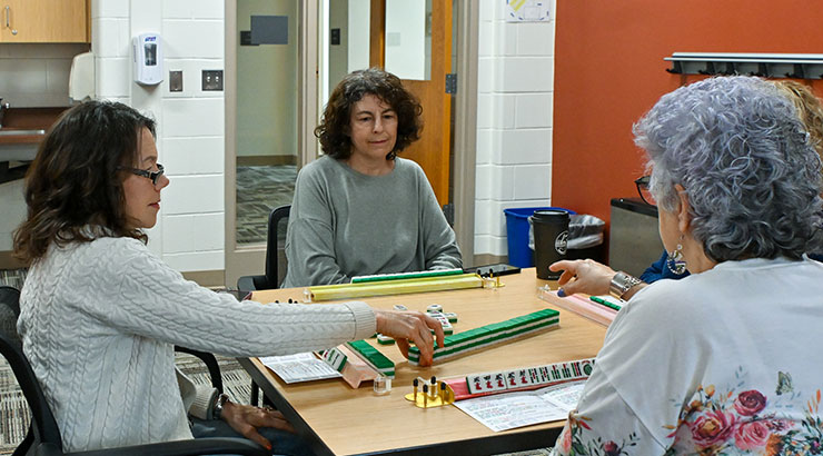 Women playing Mahjong 