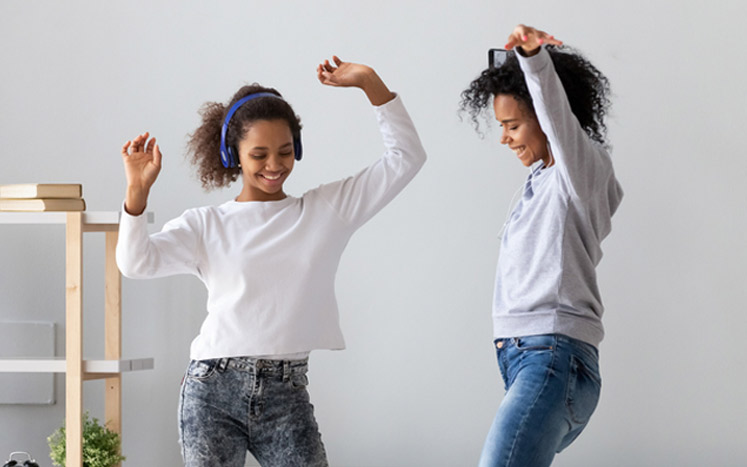 mom and daughter Zumba at home