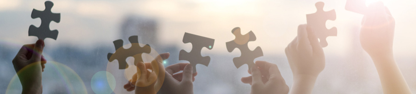 kids holding puzzle pieces